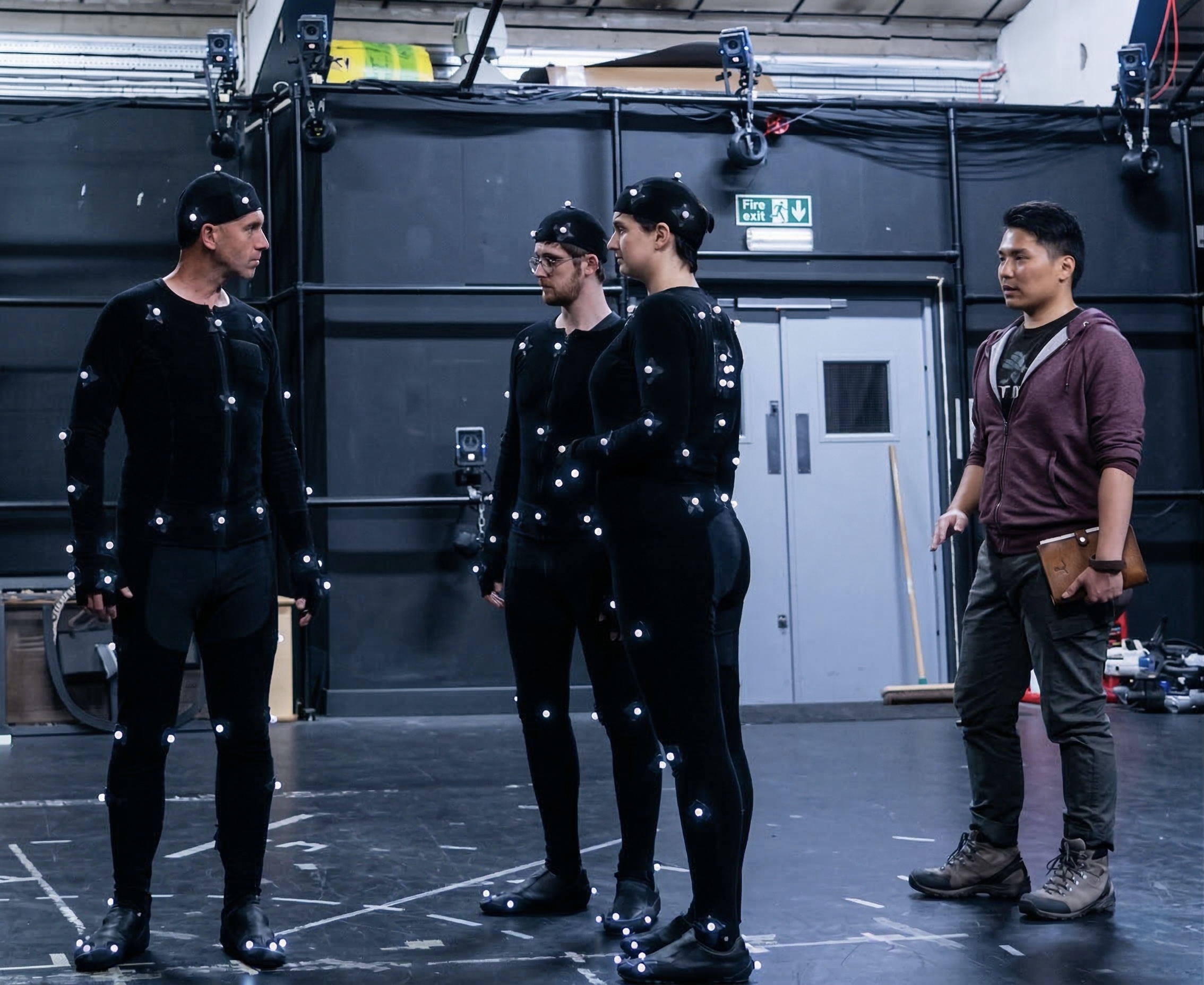 Kris Cho directing a motion capture performance session
